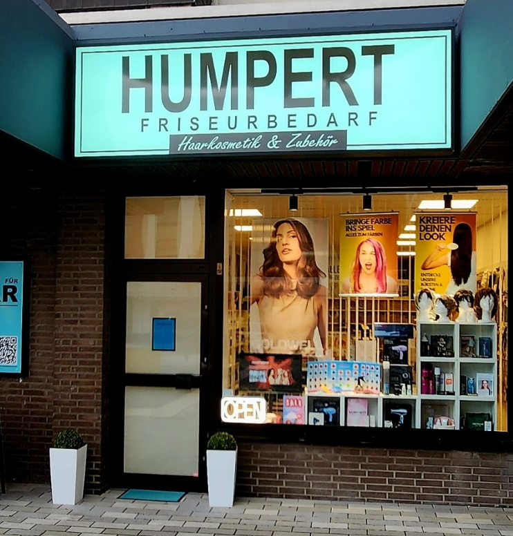 open Schild mit der Aufschrift „OPEN SHOP“ in einem Geschäft.